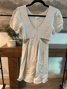 Japna sold at Anthropologie Light Beige Smocked Mini Dress with Cutouts
